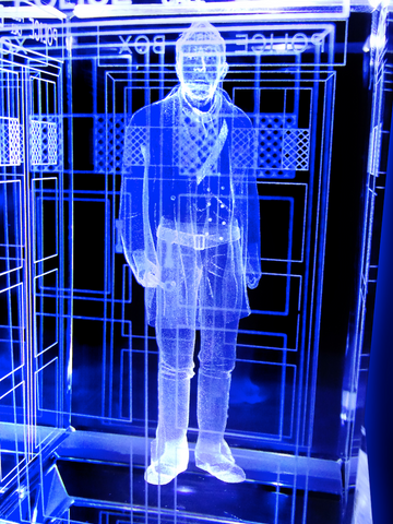 John Hurt of Doctor Who laser-engraved in a crystal TARDIS replica on an LED-lit base