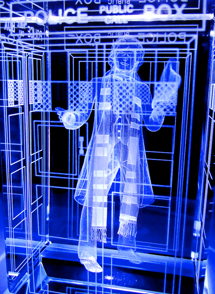 Tom Baker of Doctor Who laser-engraved in a crystal TARDIS replica on an LED-lit base