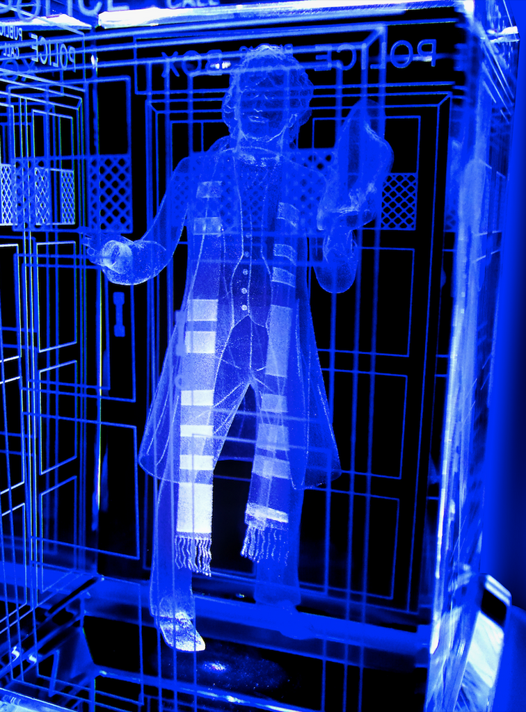 Tom Baker of Doctor Who laser-engraved in a crystal TARDIS replica on an LED-lit base